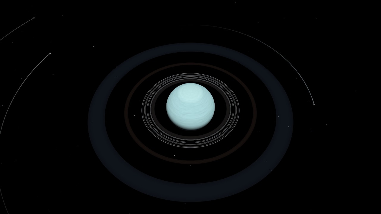 Uranus with its rings and two of its moons, lit from the side