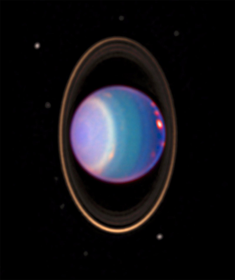 color-enhanced photo of Uranus and its rings taken by the Hubble