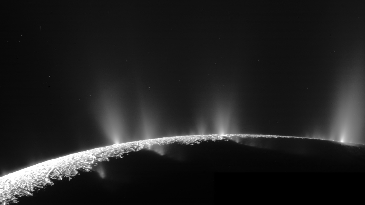 Cassini view of Enceladus plumes and surface tiger stripes