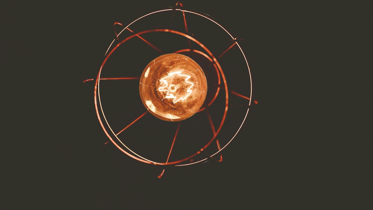 Orbital precession and frame-dragging illustration showing how orbits shift and spacetime is twisted by rotation.