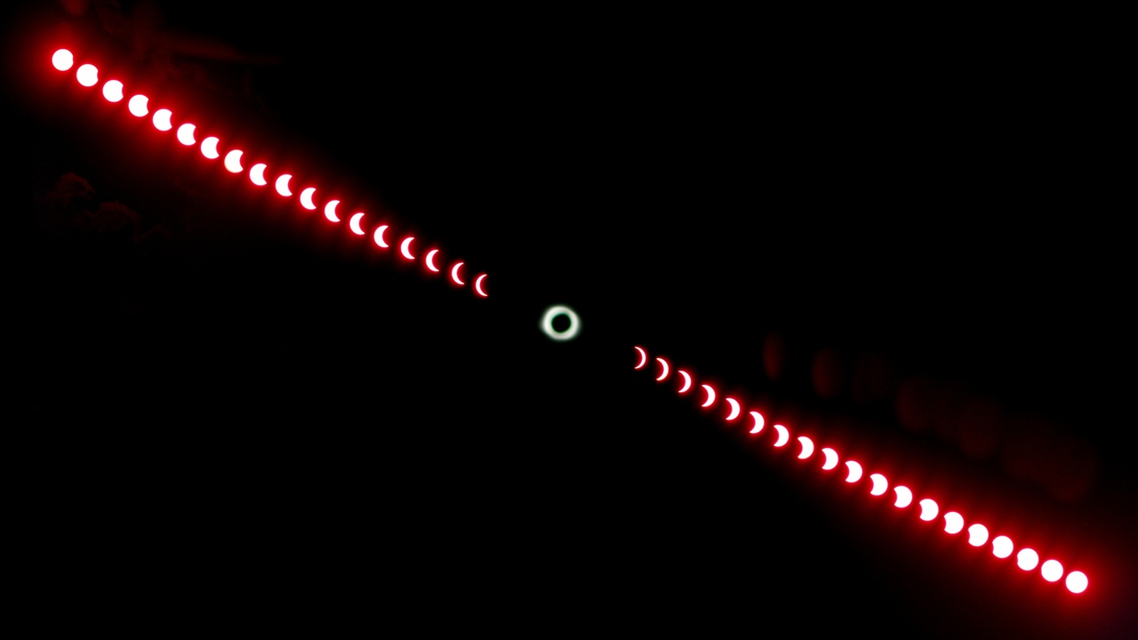 Total solar eclipse with visible corona and eclipse path