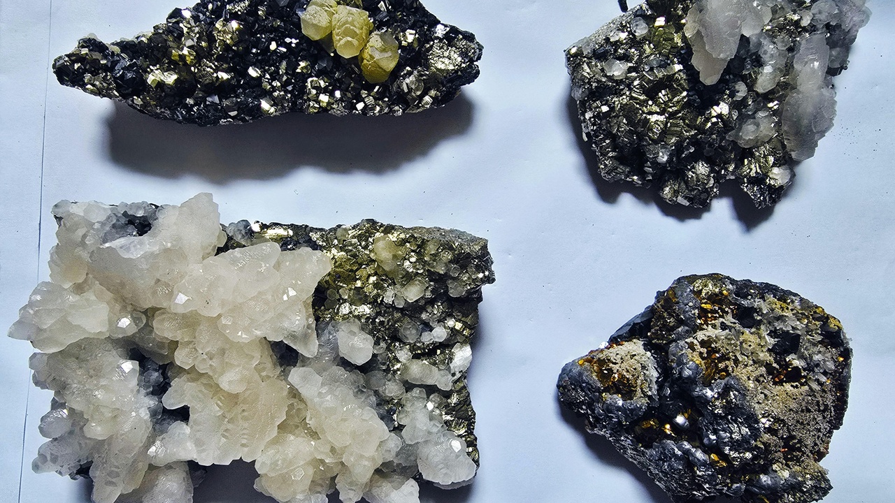 Display of museum meteorites including pallasites and large iron masses