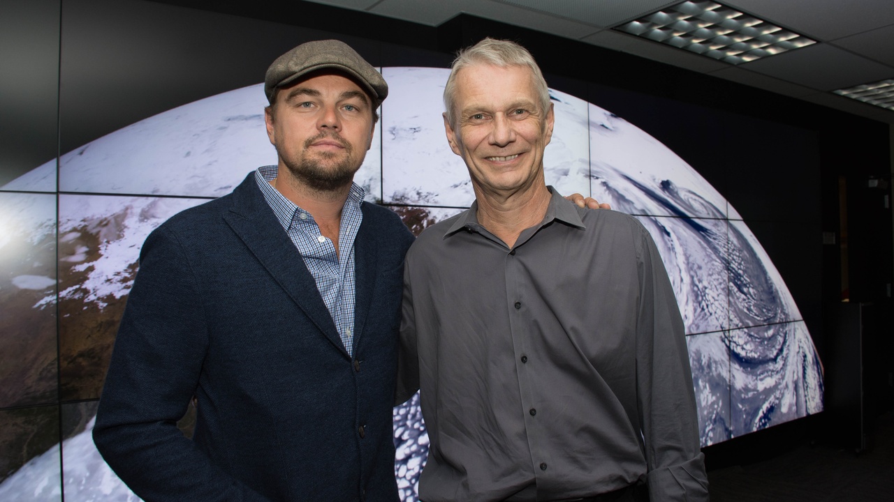 Astronaut interviews and mission control staff in documentary