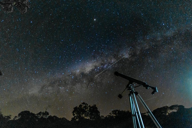 Capture of the starry sky and Milky Way with a telescope under a clear night.