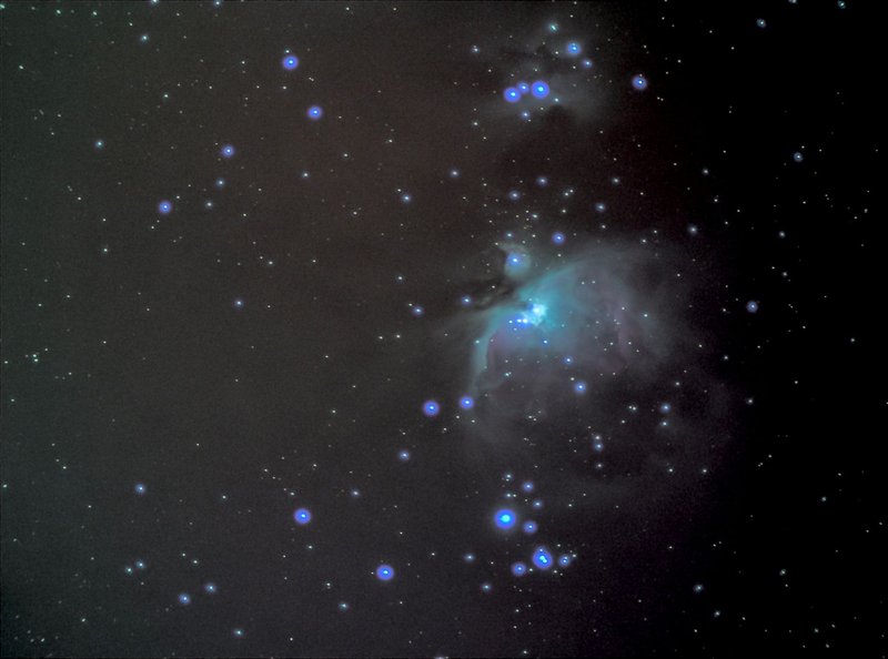 A breathtaking view of stars and nebulae in a vast cosmos under a dark sky.