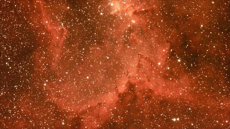 A captivating view of a red nebula in deep space astronomy.