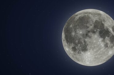 a full supermoon on a night sky